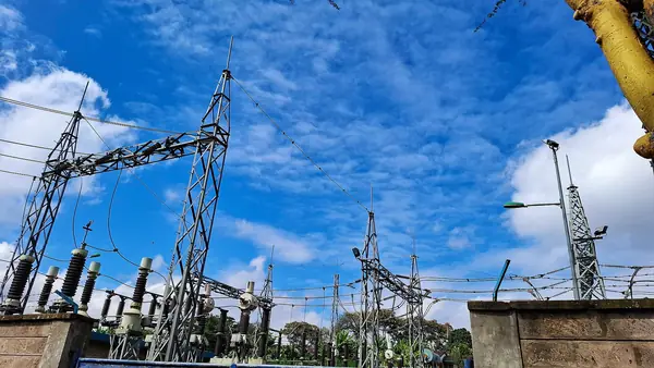 Kenya Power substation at Gigiri, Nairobi, with transmission towers against a blue sky